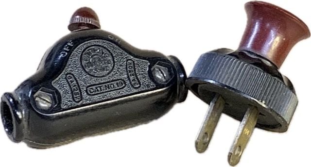 An early 1930 set of Bakelite in-line switch and plug available at The Lamp Repair Shop in South Portland, Maine.