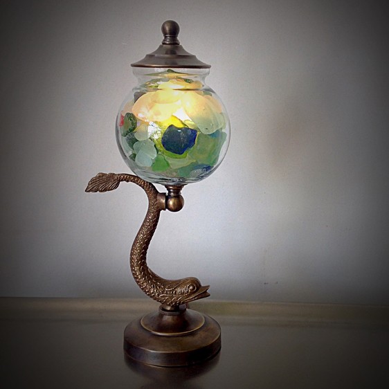 A one of a kind bronze lamp with sea glass made at The Lamp Repair Shop in South Portland, Maine.